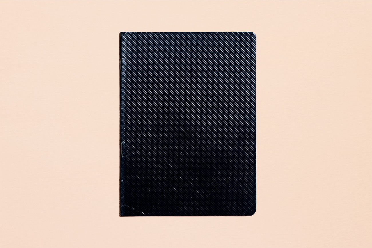 Un quaderno “dei poveri”, con la copertina nera, anni '50